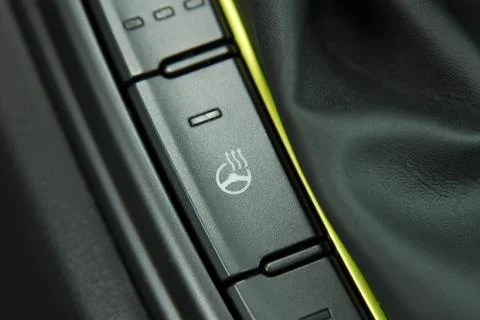 Steering wheel heating button Stock Photos