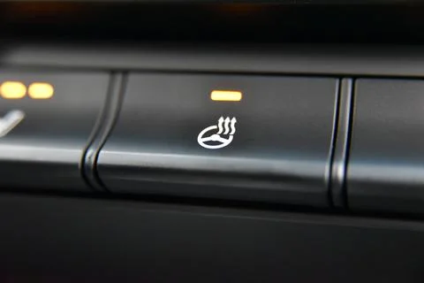 Steering wheel heating button Stock Photos