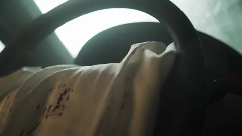 A Steering Wheel with its Airbag Deployed After a Car Crash in the Rain Stock Footage 201654302