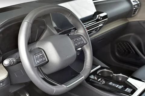 Steering wheel in the new car Stock Photos
