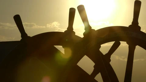 Steering wheel of the ship. Sunset. Stock Footage 68578313
