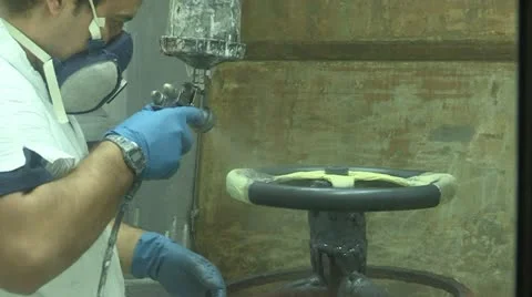 Steering wheels being painted Stock Footage 22413812
