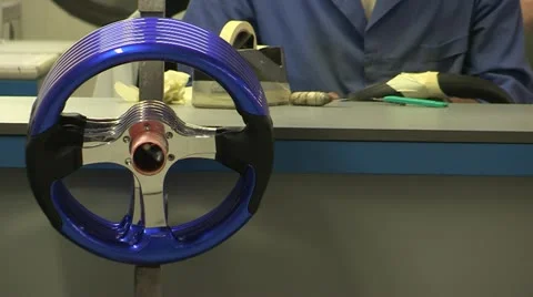 Steering wheels being prepared for paint job Stock Footage 22413805