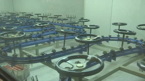 Steering wheels on a conveyor Stock Footage 22413821