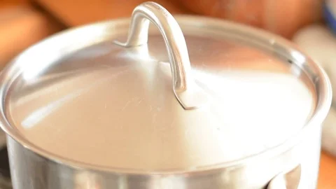 Steinless steel pot in kitchen. Stock Footage 73140059