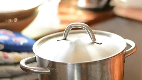 Steinless steel pot in kitchen. Stock Footage 73140597