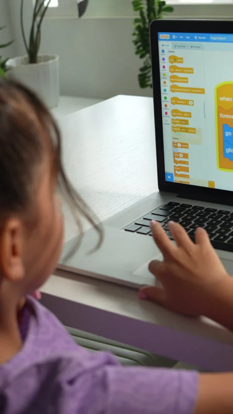 STEM Child Programming on Laptop in Vertical Video Stock Footage 314699037