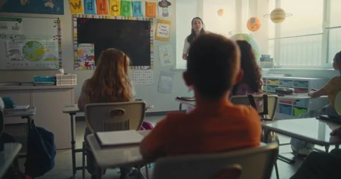 STEM Class: Female Teacher with Digital Tablet Educating Ecology to Diverse Stock Footage 313959390