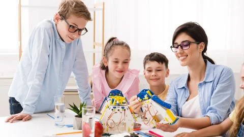 Stem education. Little technicians creating diy robot 스톡 사진