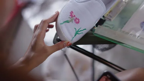 The stem of a flower is painted on a shoe Stock Footage 264930212