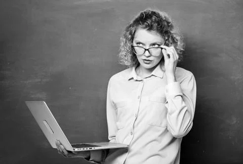 STEM student. Informatics and programming. Teacher notebook searching 库存照片