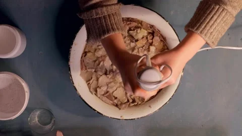 Step 2 soaking torn egg cartons in water for papier mache pulp preparation top v Stock Footage 330681278