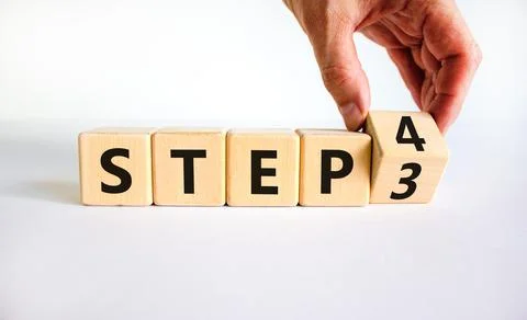 Step 3 or 4 symbol. Businessman turns a wooden cube and changes words Step 3  Stock Photos