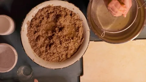 Step 3 squeezing paper pulp by hand for papier mache mixture Stock Footage 330682517