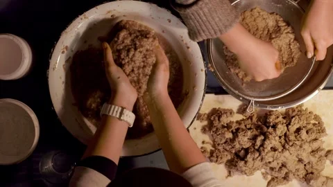 Step 3 squeezing paper pulp by hand for papier mache mixture Video stock 330683547