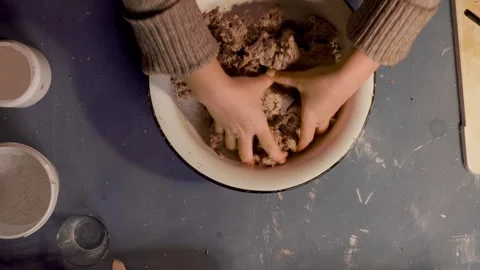 Step 4 adding glue to paper pulp for papier mache mixture Stock Footage 330684062