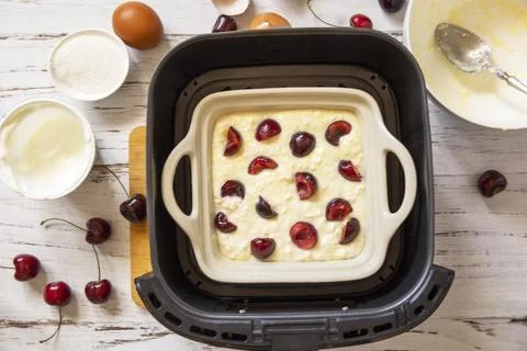Step 7. The process of cooking cottage cheese casserole with cherries  in a.. Stock Photos