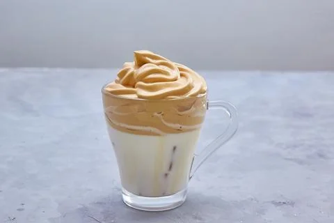 Step 8. Step by step cooking. Enjoy the ready-made trendy Korean Dalgona coffee. Stock Photos