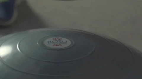Step on bosu ball in slow motion Stock Footage 37012884