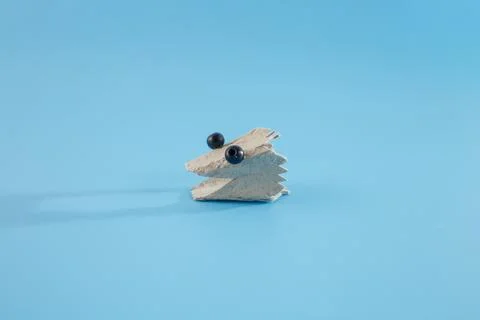 Step in creative process, head of lizard made of carton egg box, The eyes a.. Stock Photos