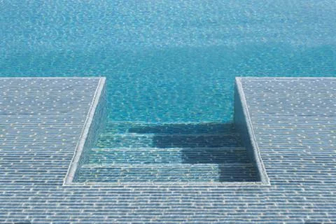 Step down into swimming pool Stock Photos