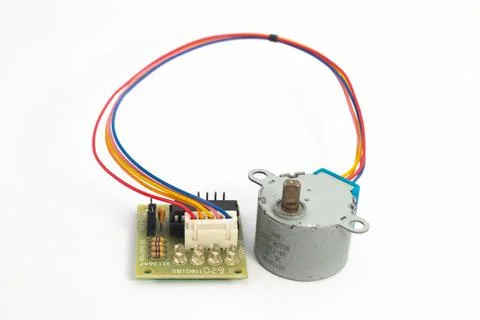 A step motor module and its driver module connected by cables. This module is Stock Photos
