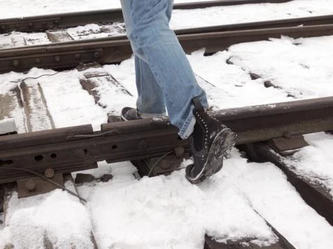 Step over the rails, walk on the sleepers Stock Photos