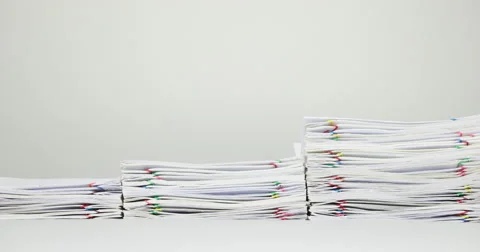 Step pile overload document of report on white table time lapse 動画素材 62769152