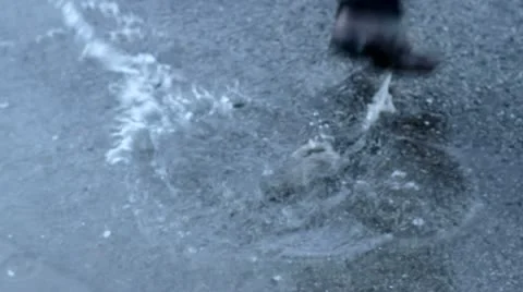 Step on puddle Stock Footage 21086674