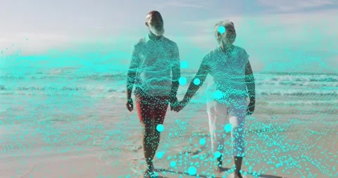 Step pulling camera in, older couple walking holding hands, turquoise overlay Stock Footage 330356055