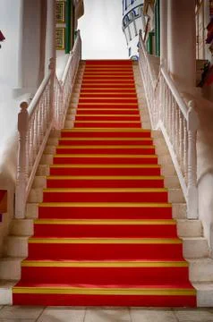 Is a step up. Red carpet to the light. Stock Photos