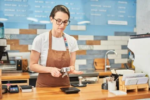 Step by step coffee preparing process in close up. Stock Photos