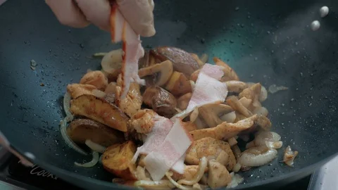 Step by step cooking: Meat hot frying pan with vegetables and meat Stock Footage 96148043