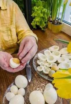 Step by step. egg cut in half, for making stuffed eggs Stock Photos