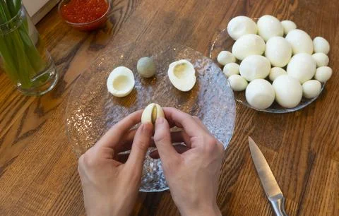 Step by step. egg cut in half, for making stuffed eggs Stock Photos