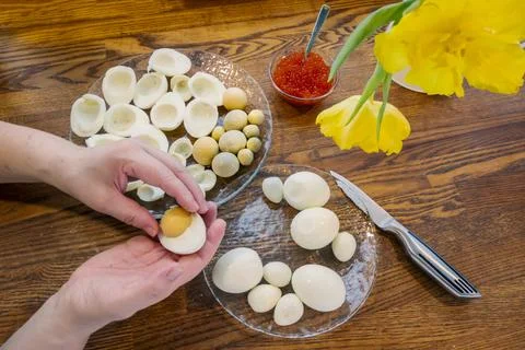 Step by step. egg cut in half, for making stuffed eggs Stock Photos