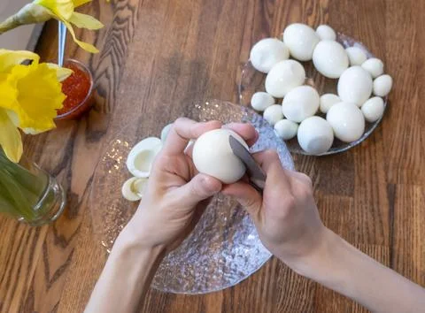 Step by step. egg cut in half, for making stuffed eggs Stock Photos