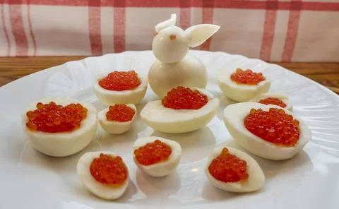 Step by step. egg rabbit figurine for decoration for making stuffed eggs Stock Photos