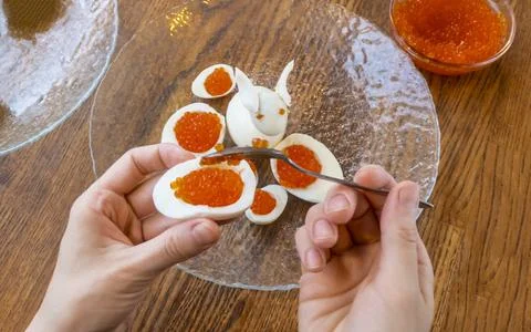 Step by step. egg rabbit figurine for decoration for making stuffed eggs Stock Photos