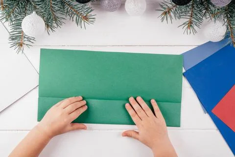 Step-by-step Greeting card 3D Christmas tree tutorial. Step 4: Fold one of ha 스톡 사진