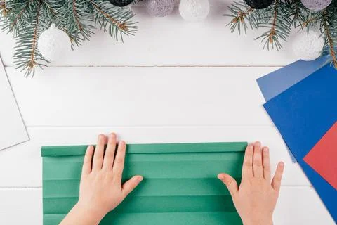Step-by-step Greeting card 3D Christmas tree tutorial. Step 7: Unfold sheet a 스톡 사진