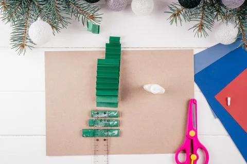 Step-by-step Greeting card 3D Christmas tree tutorial. Step 16: Begin glueing 스톡 사진