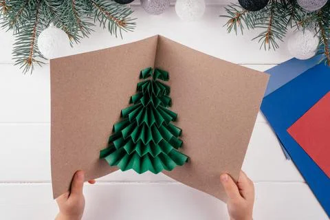 Step-by-step Greeting card 3D Christmas tree tutorial. Step 19: Open postcard 스톡 사진