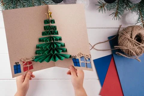Step-by-step Greeting card 3D Christmas tree tutorial. Step 20: Add appliques Stock Photos