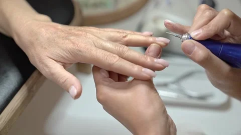 Step by Step Guide to Classic French Manicure for Mature Hands Stock Footage 323095831