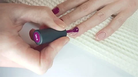 Step-by-step guide on how to apply gel polish. Step 8 Nails gel polish Stock Footage 279970470