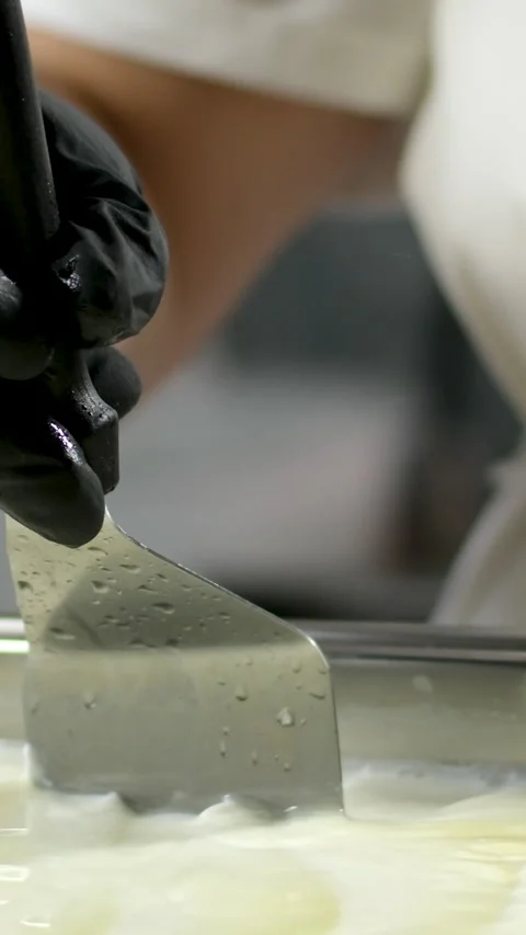 Step by step hands of skilled unrecognizable female factory worker in rubber Stock Footage 306759391