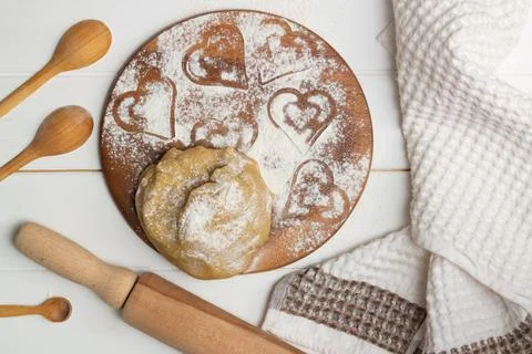 Step-by-step heart-shaped cake recipe instructions. Step 3. Add flour and sal Stock Photos