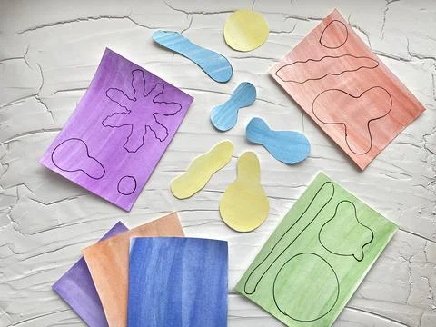 Step by step how to make bacteria and viruses from colored paper with childre Stock Photos