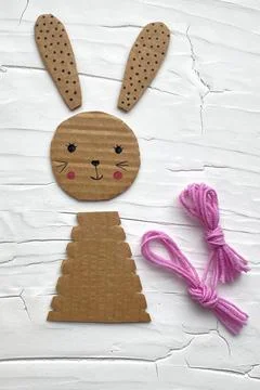 Step by step, how to make a bunny out of cardboard, children's creativity. Stock Photos